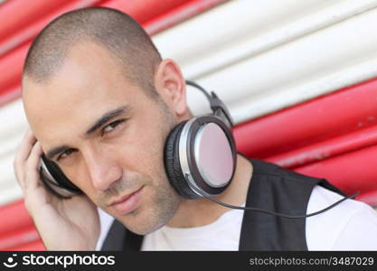 Young man with music headphones