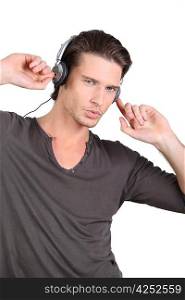 Young man with music in headphones