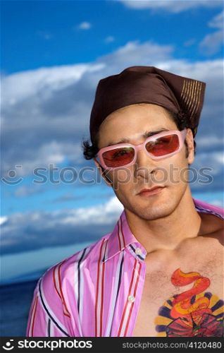 Young Man With Sunglasses and Headscarf