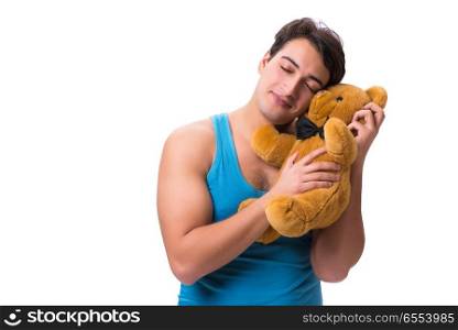 Young man with toy animal isolated on white background