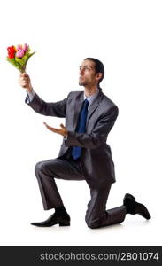 Young man with tulip flowers