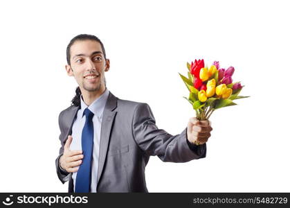 Young man with tulip flowers