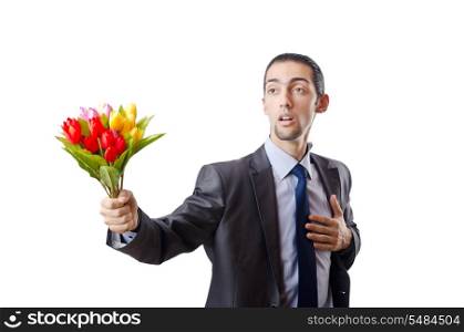 Young man with tulip flowers