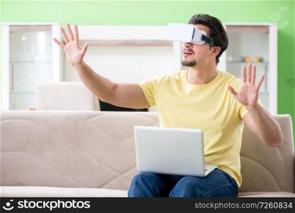 Young man with virtual reality goggles