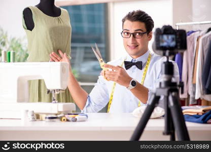 Young man working as fashion video blogger