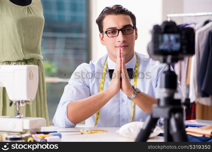 Young man working as fashion video blogger