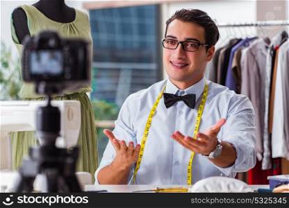 Young man working as fashion video blogger
