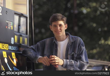 Young Man Working at Gas Station