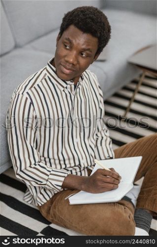 young man working from modern home