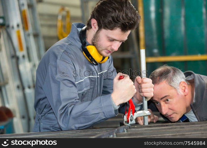 young man working in a mechanic shop