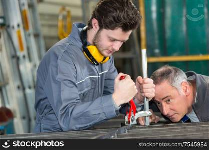young man working in a mechanic shop