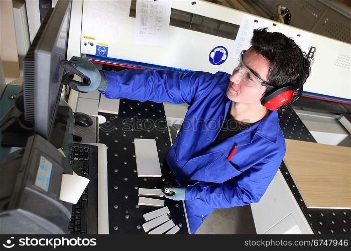 Young man working in a warehouse
