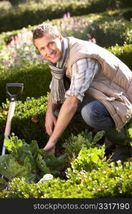 Young man working in garden