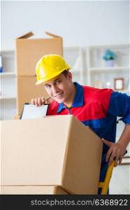 Young man working in relocation services with boxes