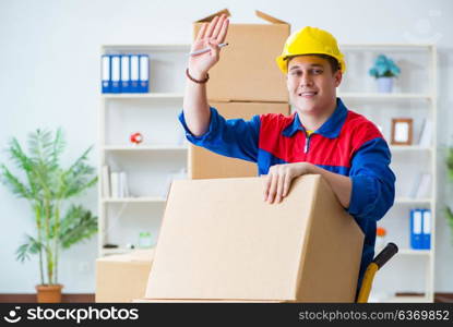 Young man working in relocation services with boxes