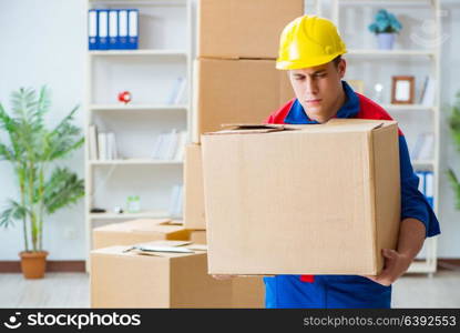 Young man working in relocation services with boxes