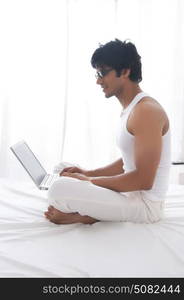 Young man working on laptop