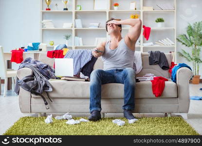 Young man working studying in messy room