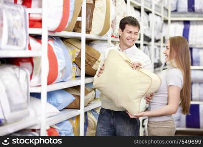 Young married couple shopping in a store