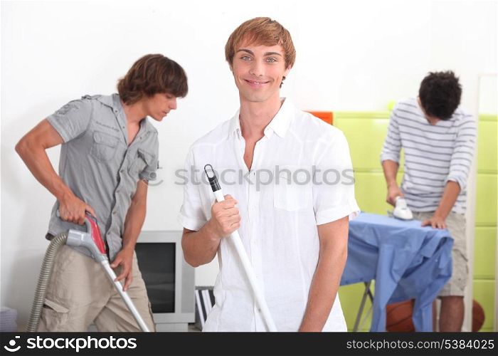 Young men cleaning