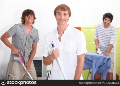 Young men doing household chores