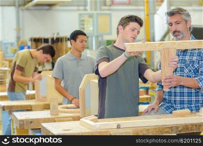 young men in the workshop