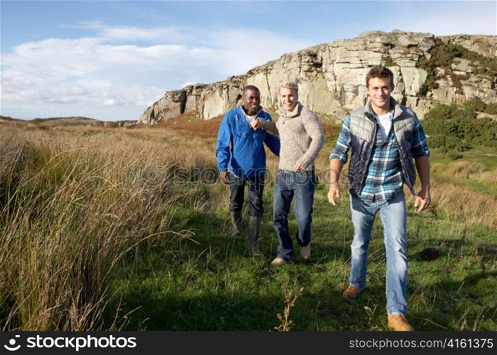 Young men on country walk