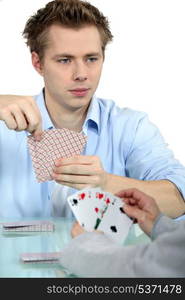 Young men playing cards