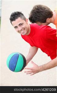 Young men playing handball