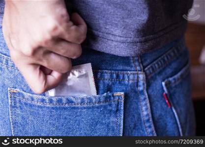 Young men&rsquo;s jeans back pocket to carry condoms on Valentine&rsquo;s holiday.