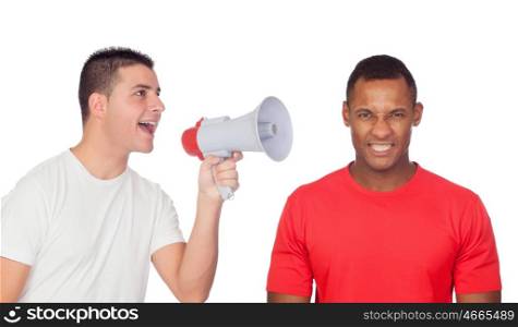 Young men screams to his angry friend through a megaphone isolated on a white background
