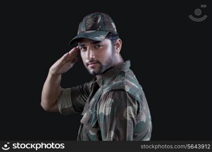 Young military officer saluting