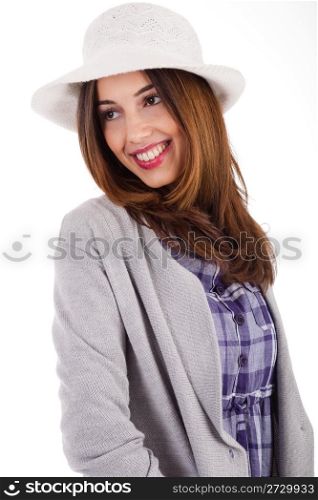 Young model with spring clothing and white hat on a white isolated background