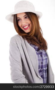 Young model with spring clothing and white hat on a white isolated background