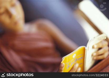 Young Monk Reading a Book