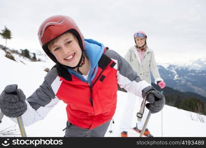 Young Mother And Son On Ski Vacation