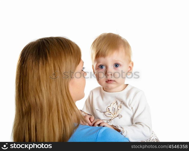 young mother having fun with her little son on the floor