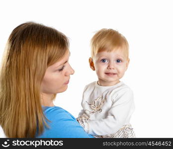 young mother having fun with her little son on the floor