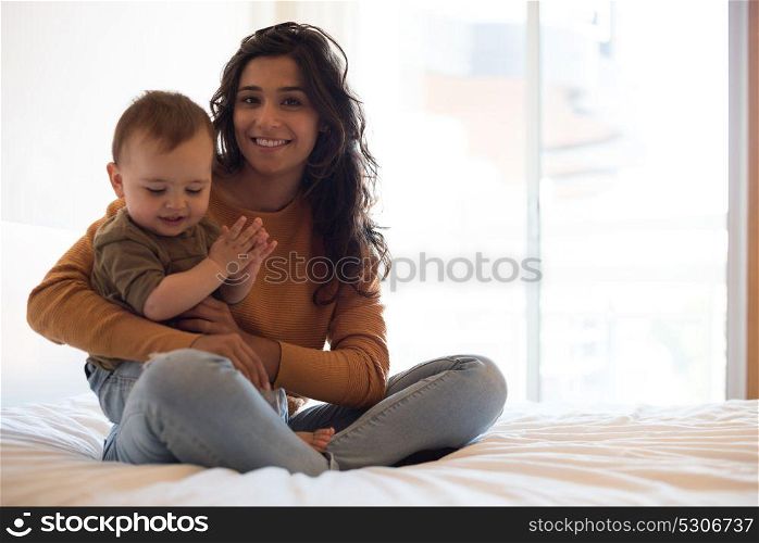 Young Mother spending time with her little baby