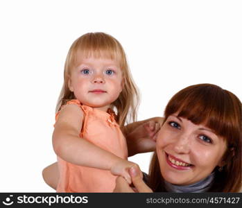 Young mother with little daughter in studio