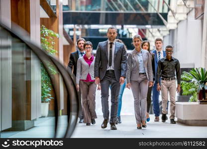 young multi ethnic business people group walking standing and top view