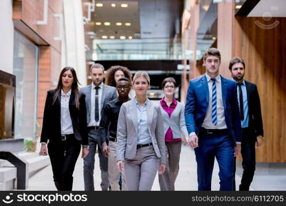 young multi ethnic business people group walking standing and top view