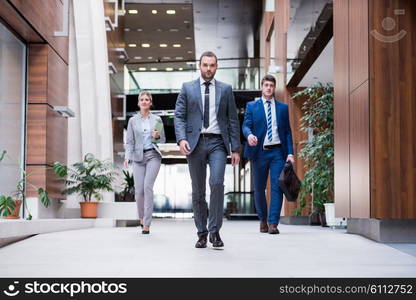 young multi ethnic business people group walking standing and top view