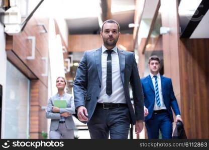 young multi ethnic business people group walking standing and top view