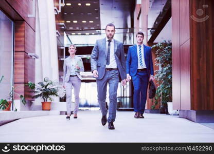 young multi ethnic business people group walking standing and top view