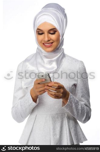 Young muslim girl on white