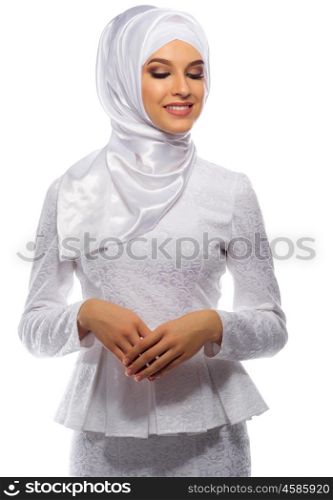 Young muslim girl on white