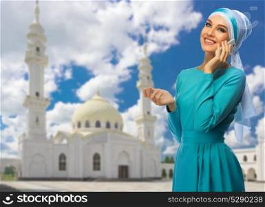 Young muslim woman at mosque background