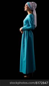 Young muslim woman in blue dress isolated