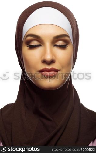 Young muslim woman isolated on white